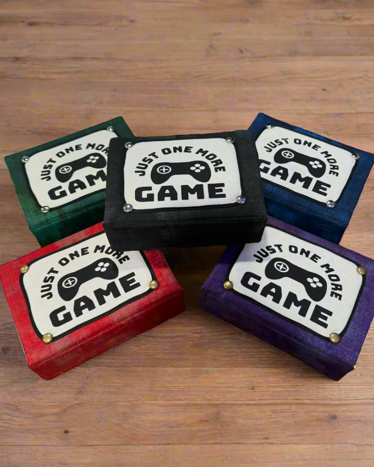 FlexBox One More Game fabric storage box with screen-printed game-controller panel, shown in multiple colorways