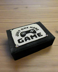 Black FlexBox One More Game fabric storage box with silver hardware and game-controller panel