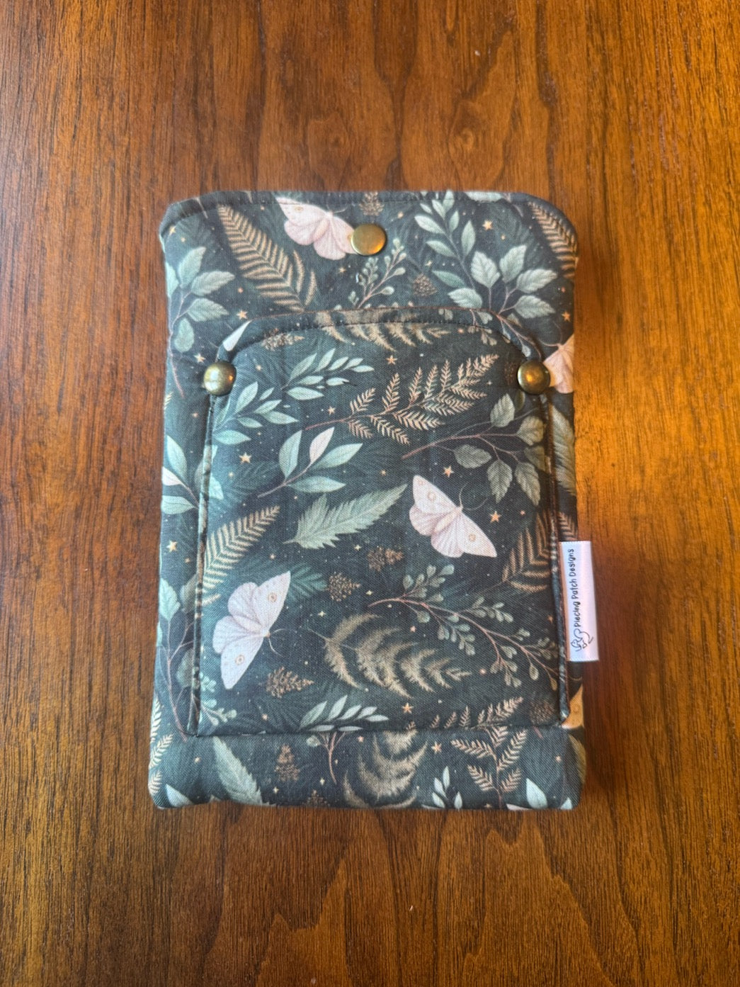 Small padded fabric device sleeve with Fern Moth design