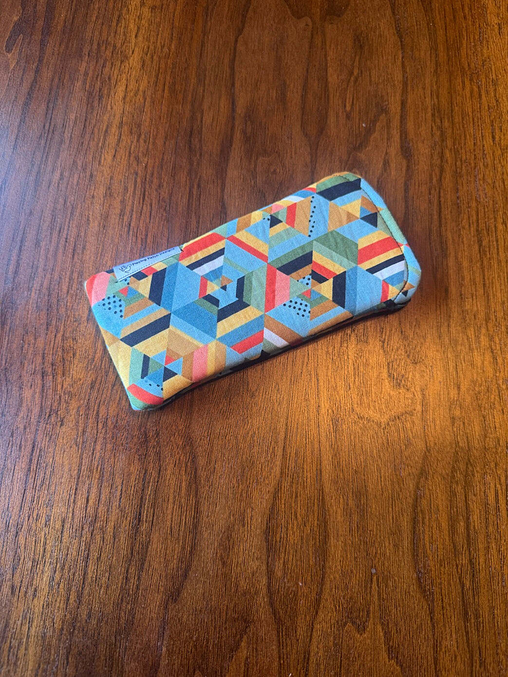 Padded fabric eyeglass case in Quilt Hexi design, with built-in lens cloth