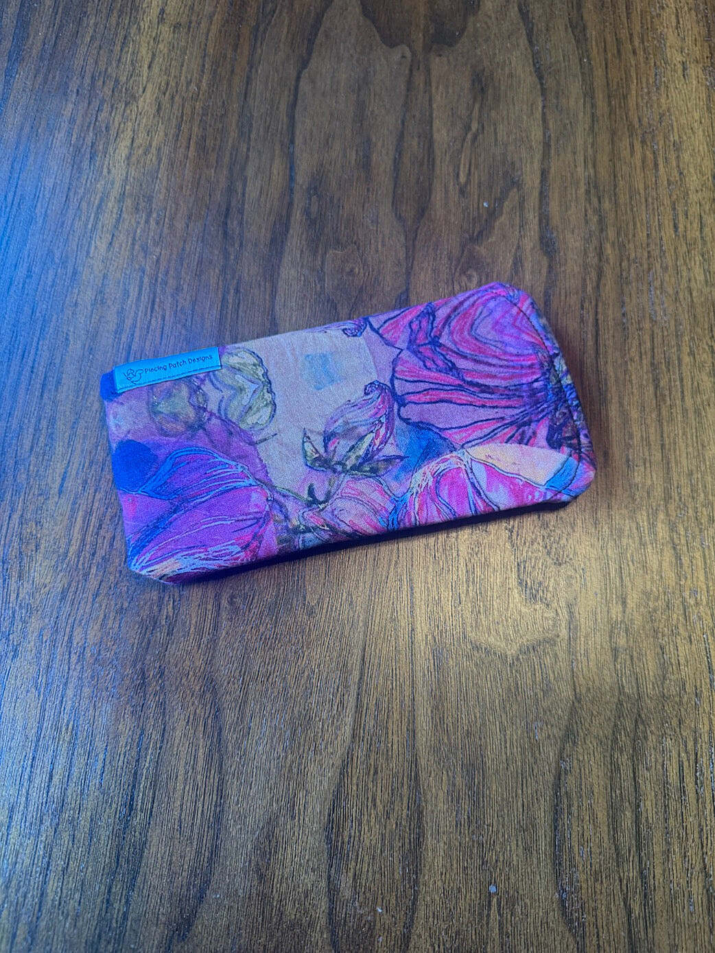 Padded fabric eyeglass case in Hibiscus design, with built-in lens cloth