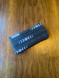 Padded fabric eyeglass case in Moon Phases design, with built-in lens cloth