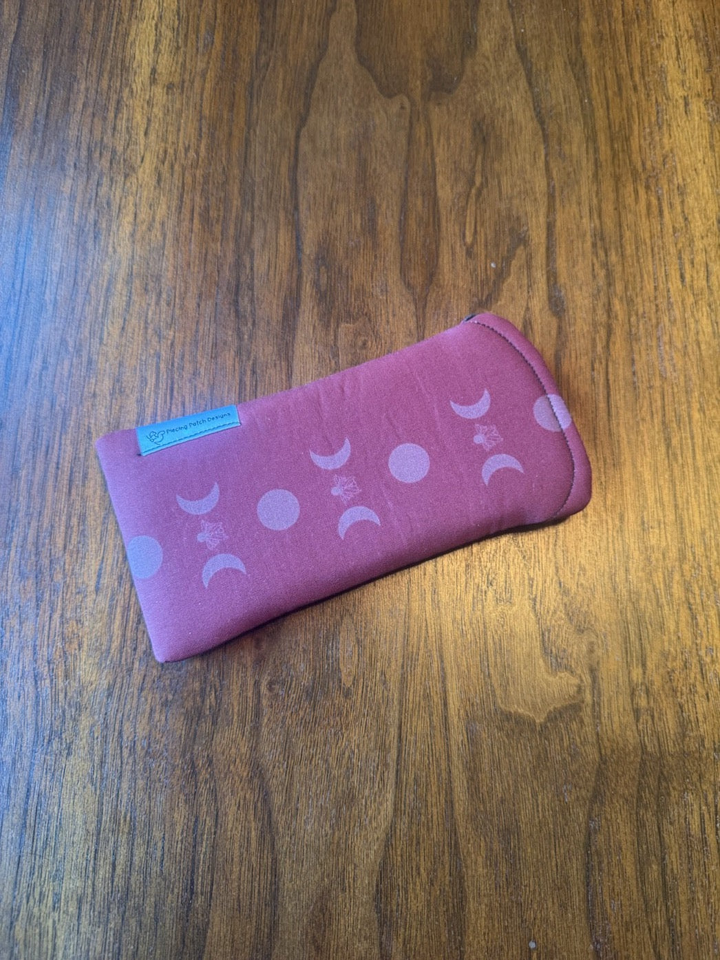 Padded fabric eyeglass case in Triple Moon Goddess design, with built-in lens cloth