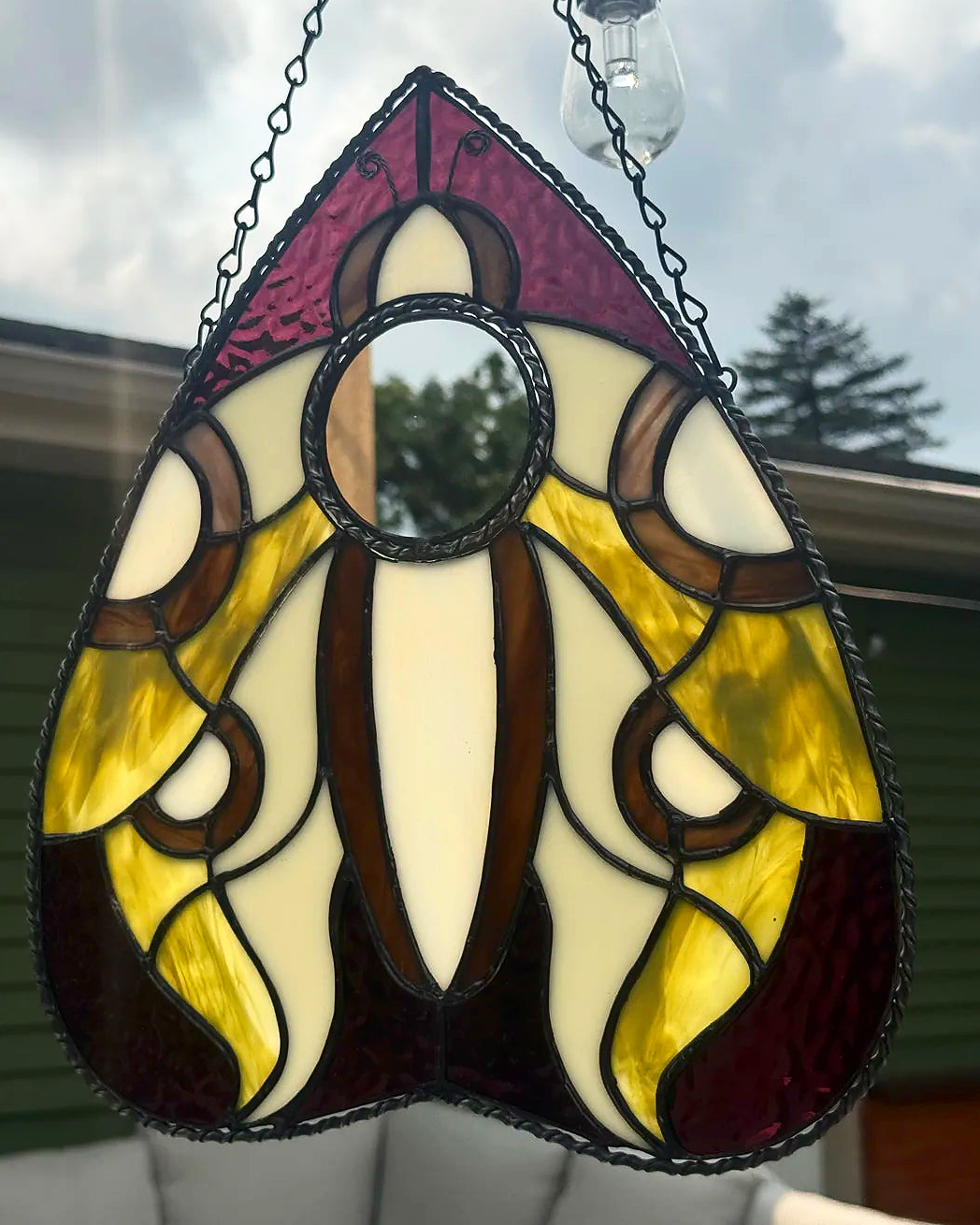 Luna moth planchette stained-glass suncatcher with mirror center and hanging chain