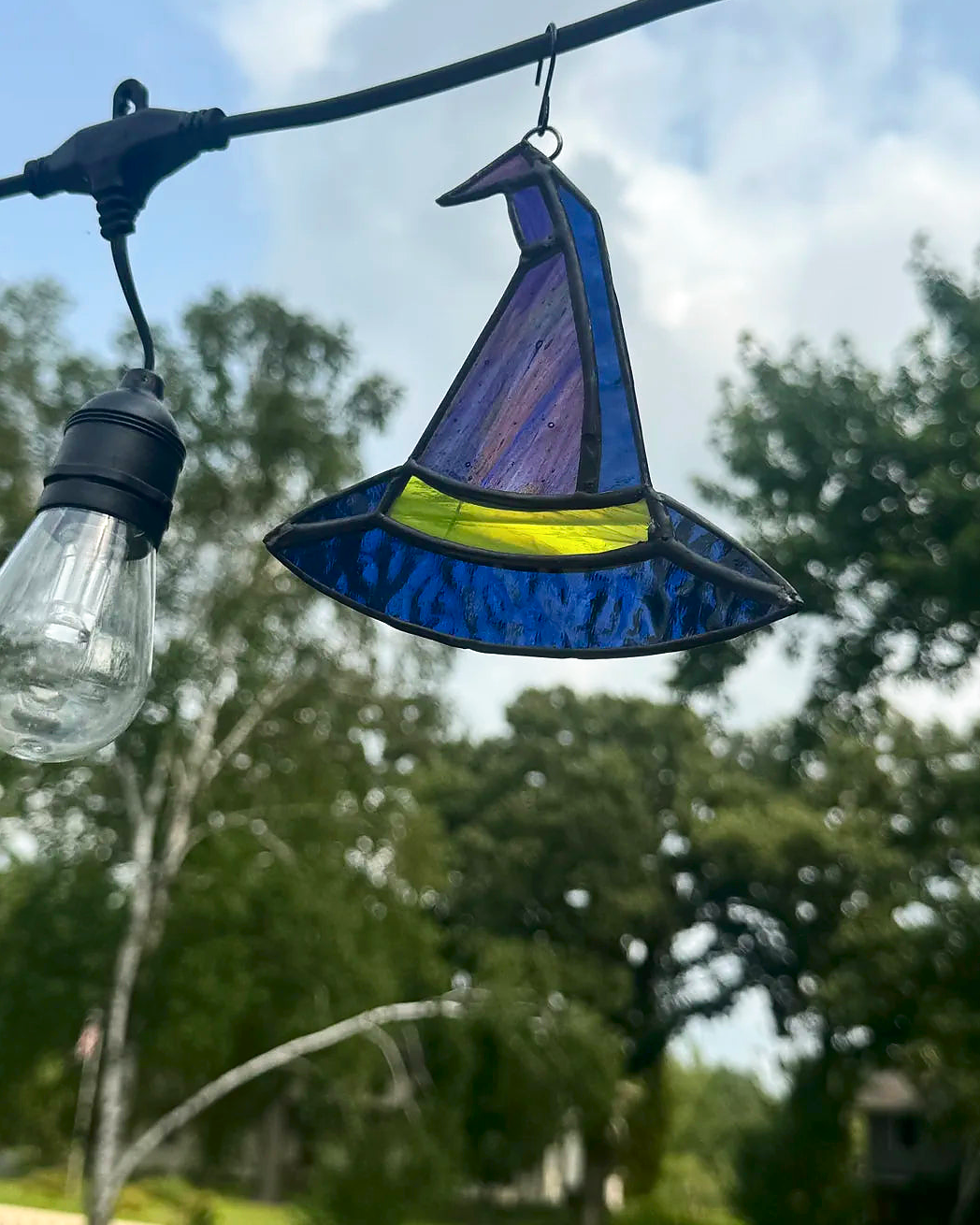 Witch's Hat stained-glass suncatcher in a pointed black hat shape